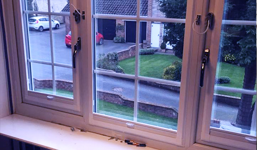 photo of dan fitting double glazing unit